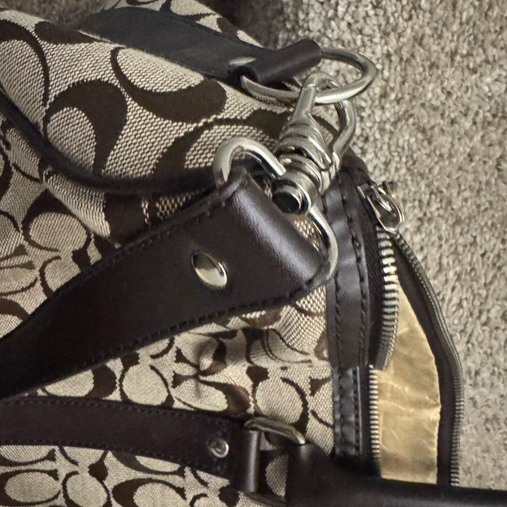 Coach duffle bag khaki/brown w/strap slight wear/tear. - Picture 5 of 14